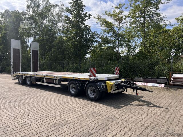 Rimorchio a pianale ribassato Möslein T4 VB H1 gerade  neuer 4 Achs Tieflader gerade hydraulischen Rampen