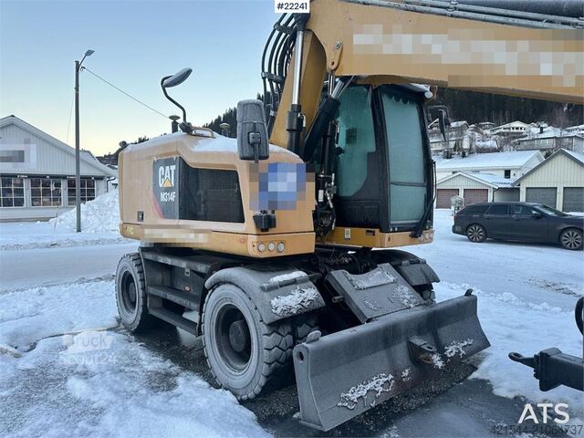 Escavatore gommato CAT M314F wheeled excavator w/ two buckets, Gigant tra
