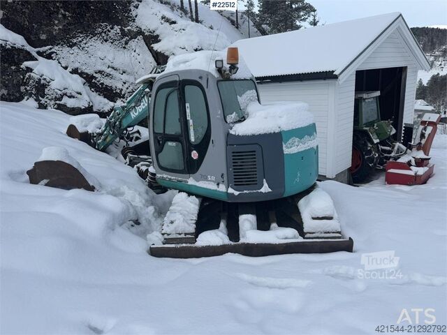 Mini-excavator Kobelco SK60SR excavator with digging bucket, hydraulic gr
