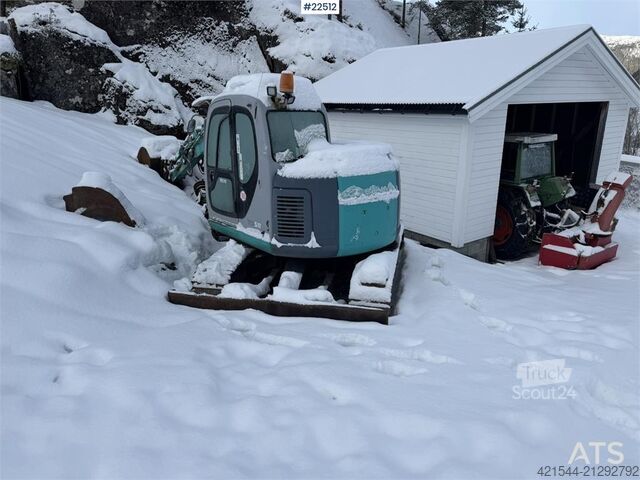 Mini-excavator Kobelco SK60SR excavator with digging bucket, hydraulic gr