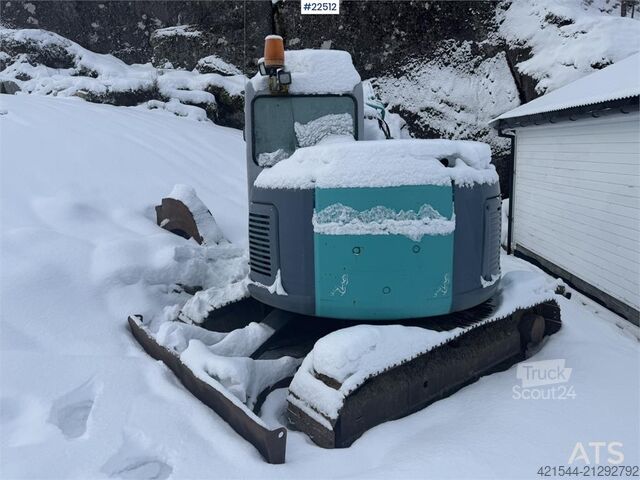 Mini-excavator Kobelco SK60SR excavator with digging bucket, hydraulic gr