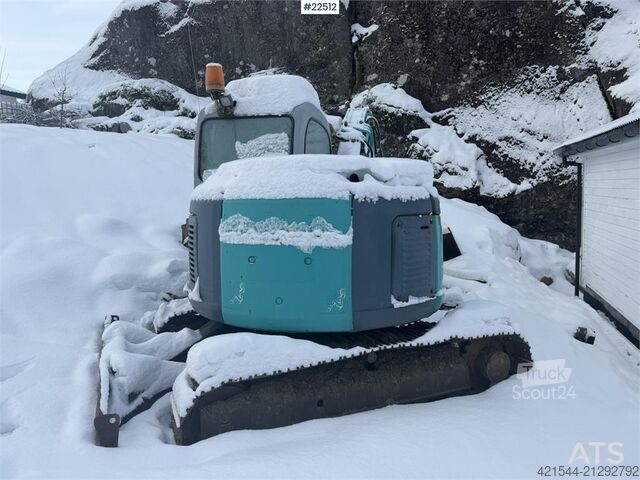 Mini-excavator Kobelco SK60SR excavator with digging bucket, hydraulic gr