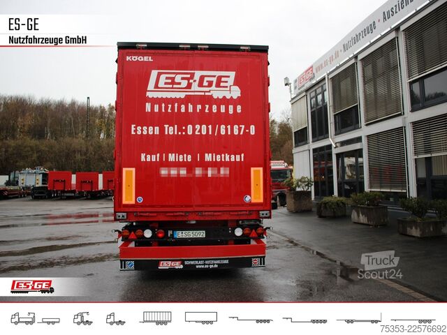 Semirimorchio con telone KÖGEL 3-Achs-Cargo-Coil-Pritschensattelanhänger