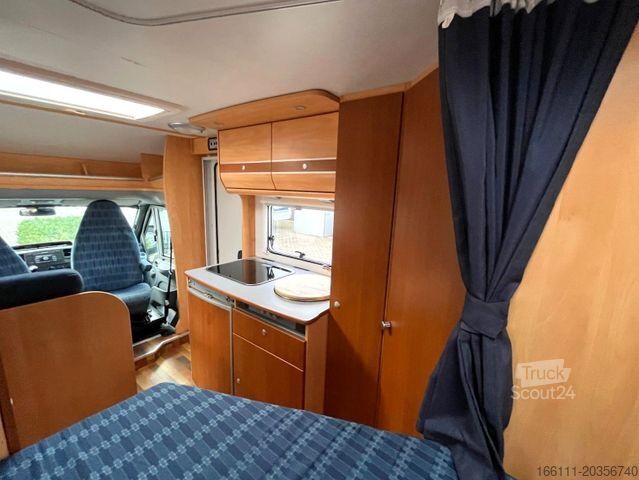 Halvintegrerad husbil SUNLIGHT T 58 - Festbett - Klima - Tempomat -