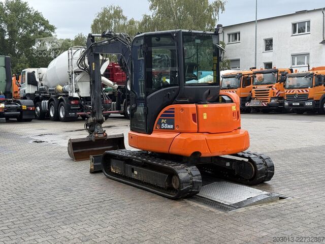 Kettenbagger KOMATSU PC58MR-5E0 Tiltrotator OQ45-5 / 2.336 h