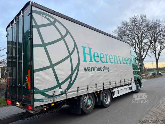 Transport af volumen Volvo FH 460 Globe XL 6 x 2 volumencombi met 2 ass aa...