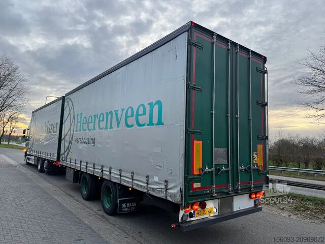 Transport af volumen Volvo FH 460 Globe XL 6 x 2 volumencombi met 2 ass aa...