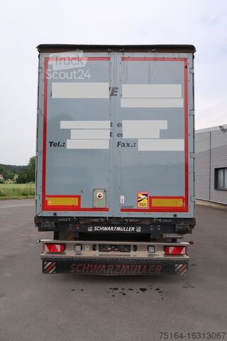 Semi-remorque à plateau & bâche Schwarzmüller J-Serie