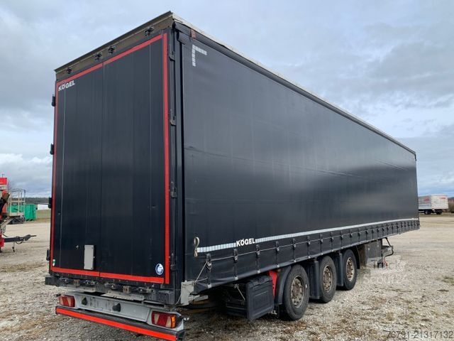 Semiremorcă deschisă cu prelată KÖGEL SN 24 Mega_ Hubdach_ Liftachse_ SAF