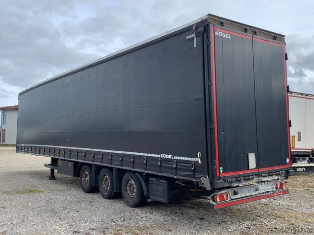 Semiremorcă deschisă cu prelată KÖGEL SN 24 Mega_ Hubdach_ Liftachse_ SAF