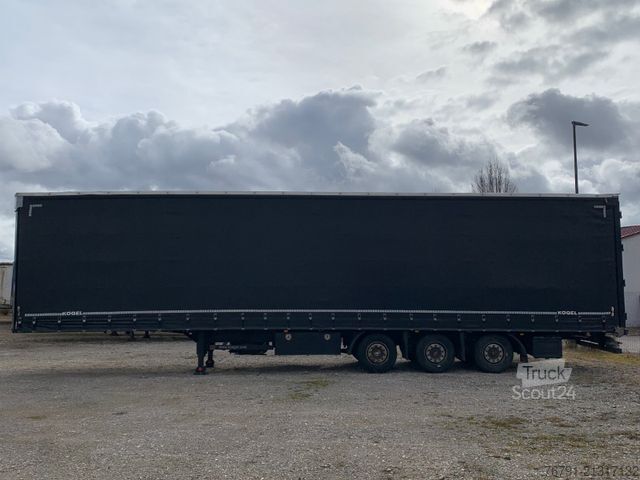 Semiremorcă deschisă cu prelată KÖGEL SN 24 Mega_ Hubdach_ Liftachse_ SAF