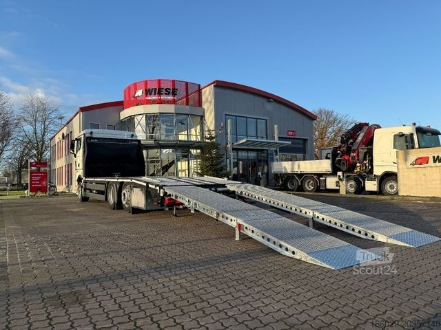 Biltransport lastbil MAN Baumaschinen-  Arbeitsbühnentransporter Rampen