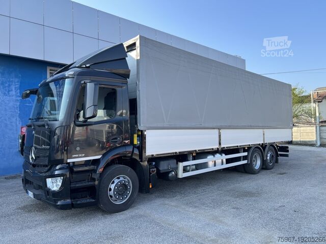 Camión plataforma con toldo Mercedes-Benz Antos 2532