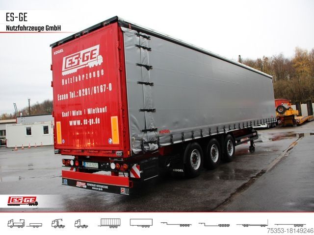 Auflieger mit Pritsche & Plane KÖGEL 3-Achs-Cargo-Coil-Pritschensattelanhänger