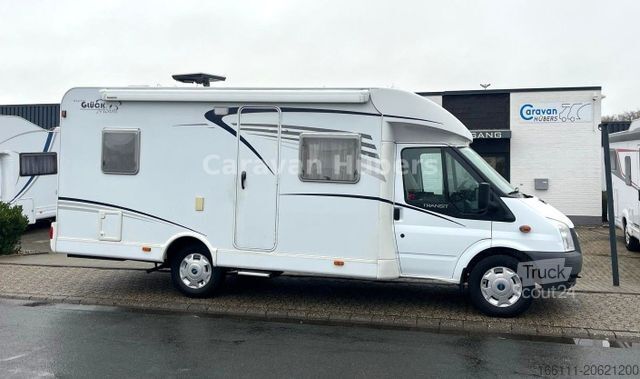 Teilintegriertes Wohnmobil GLUECKSMOBIL T 345 - Festbett - Klima - Sat/TV - Solar -