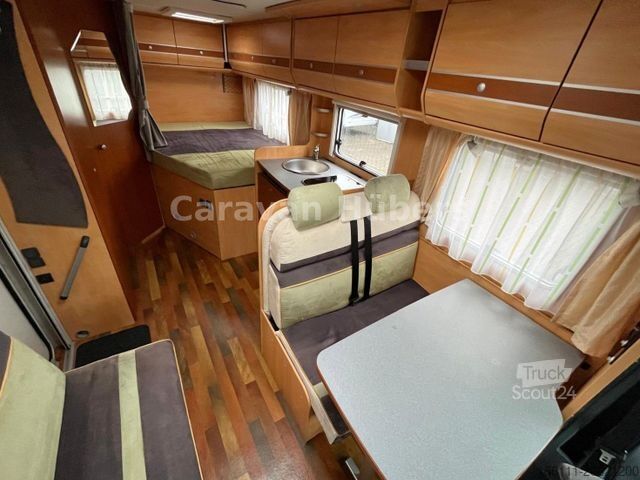 Teilintegriertes Wohnmobil GLUECKSMOBIL T 345 - Festbett - Klima - Sat/TV - Solar -