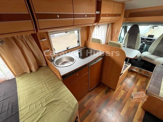 Teilintegriertes Wohnmobil GLUECKSMOBIL T 345 - Festbett - Klima - Sat/TV - Solar -