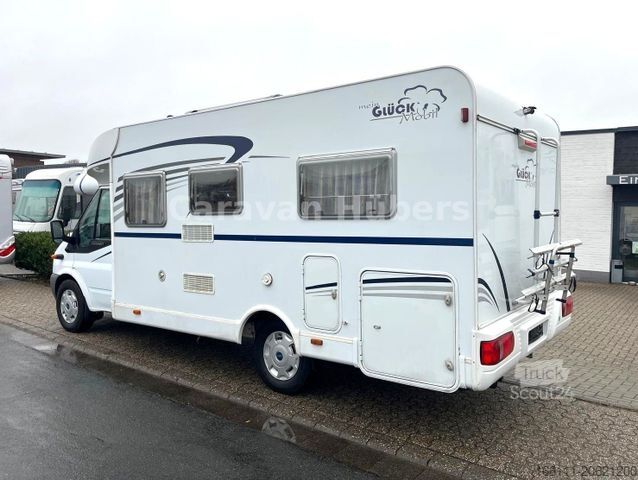 Teilintegriertes Wohnmobil GLUECKSMOBIL T 345 - Festbett - Klima - Sat/TV - Solar -