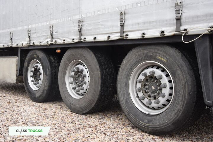 відкритий напівпричіп з тентом SCHMITZ CARGOBULL SCS24/L Lifting Axle