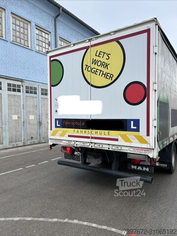 LKW mit Pritsche & Plane MAN 