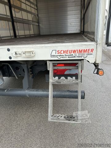 LKW mit Pritsche & Plane MAN 