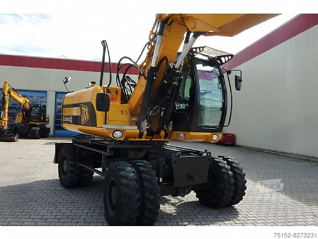 حفارة بعجلات JCB JS 200 W mit OilQuick