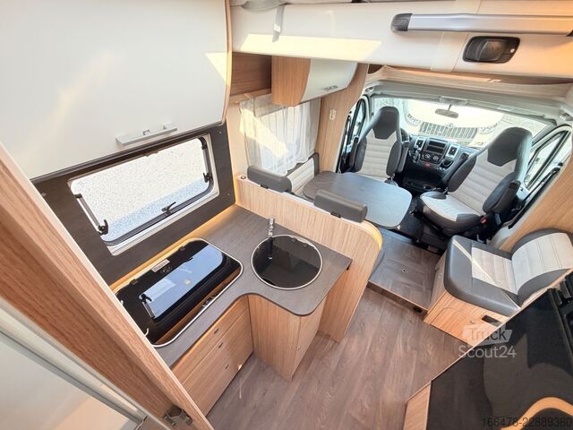 Caravana semiintegrada SUNLIGHT T 69 L *Queensbett-Hubbett*
