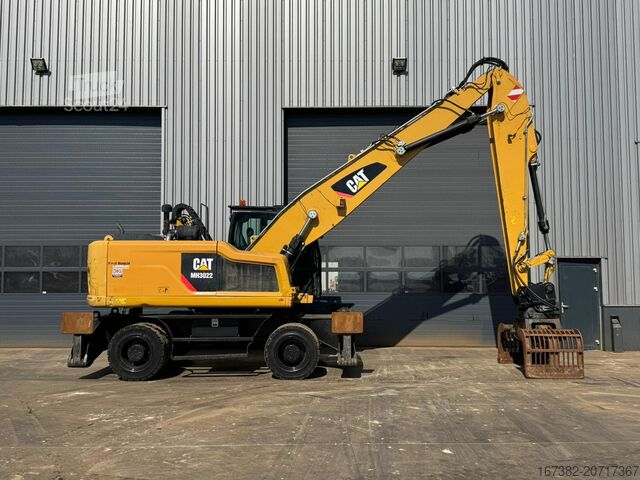 Materiālu apstrādes mašīna Caterpillar MH3022
