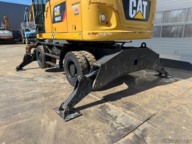 Materiālu apstrādes mašīna Caterpillar MH3022