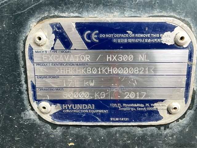 Vikšrinis ekskavatorius Hyundai HX300 NL with a bucket