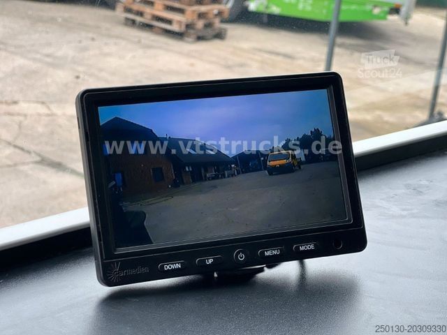 Haakarm vrachtwagen MAN TGX 26.400 6x2 HIAB Abroller