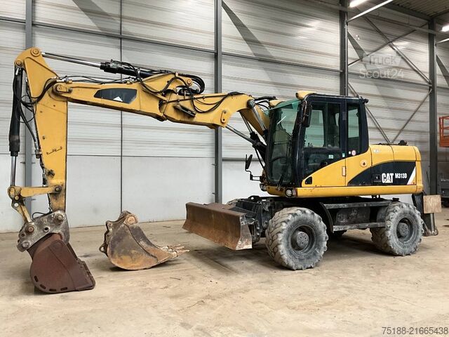 Excavadora de ruedas CAT M 313 D