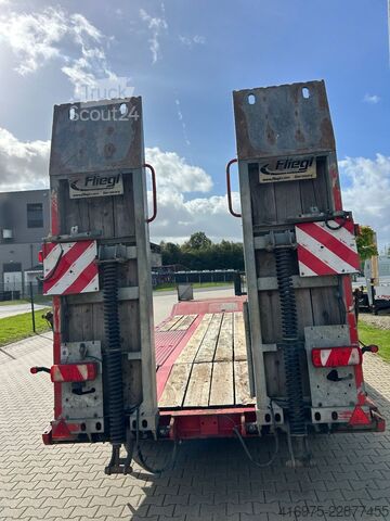 Remorcă cu platformă joasă FLIEGL DTS 300 3-Achs Tieflader Federrampen