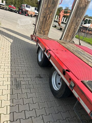 Remorcă cu platformă joasă FLIEGL DTS 300 3-Achs Tieflader Federrampen