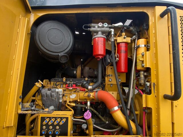 Niveleuse Caterpillar 140M Ripper + Pushblock