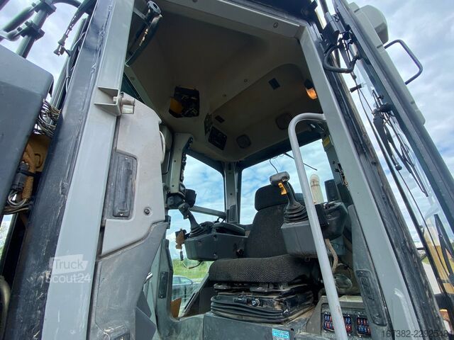 Niveleuse Caterpillar 140M Ripper + Pushblock