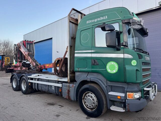 Kokmateriālu transportieris Scania R560 V8 **6X4+JONSERED 1020 CRANE**