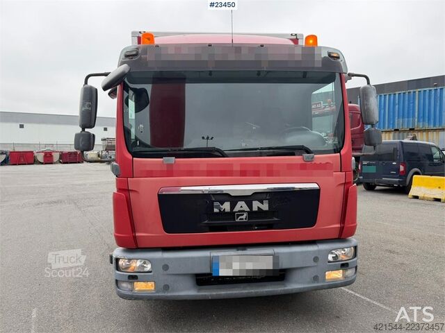  MAN TGL 8.220 4x2 box truck with a 2-ton lift