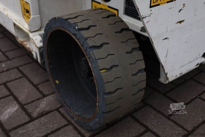 Scissor lift Holland Lift Ecostar HL-9710 Electric, 12m Working Height, 325k