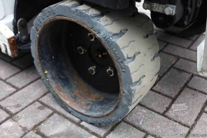 Ножичний підйомник Holland Lift Ecostar HL-9710 Electric, 12m Working Height, 325k