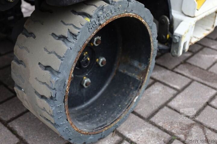 Scissor lift Holland Lift Ecostar HL-9710 Electric, 12m Working Height, 325k