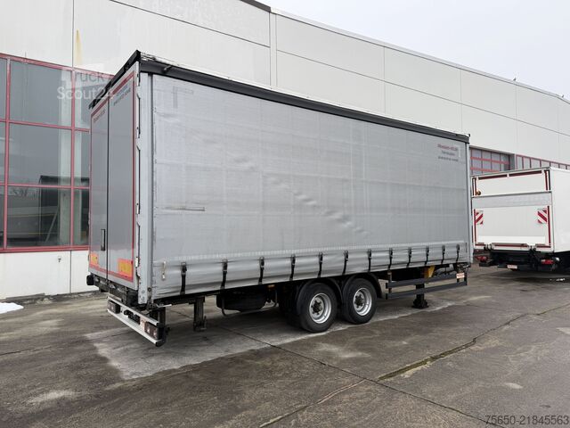 Открытый прицеп с тентом Möslein TPW 105 D Schwebheim  Tandemplanenanhänger