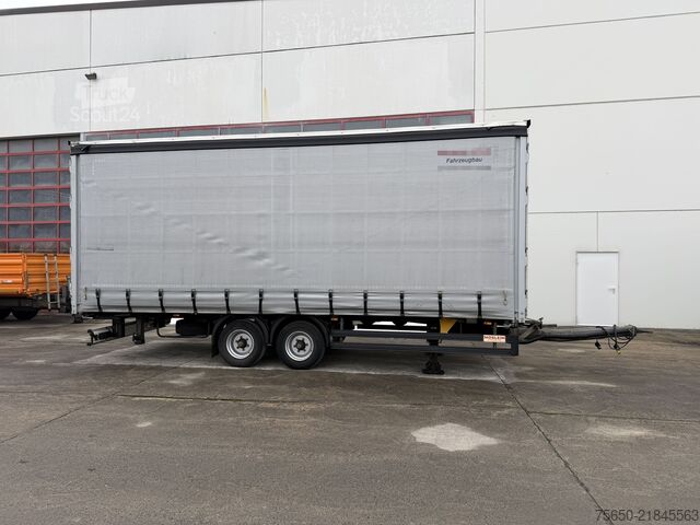 Открытый прицеп с тентом Möslein TPW 105 D Schwebheim  Tandemplanenanhänger