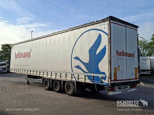 مقطورة نصفية مفتوحة مع قماش مشمع Schmitz Cargobull Curtainsider Mega Getränke