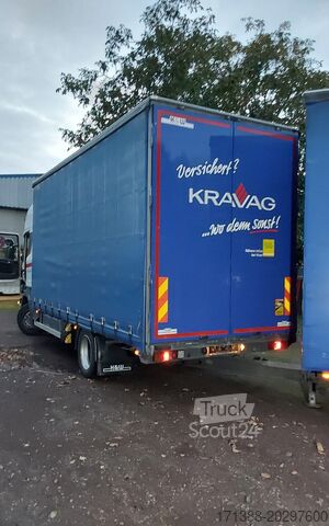 Nákladní automobil s plošinou a plachtou Scania Jumbo