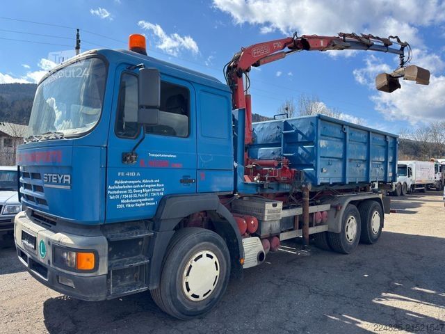 Tovornjak s kavljem za kontejnerje MAN STEYR 33S41 ABROLLCONTAINER+KRAN FASSI+CONTAINER