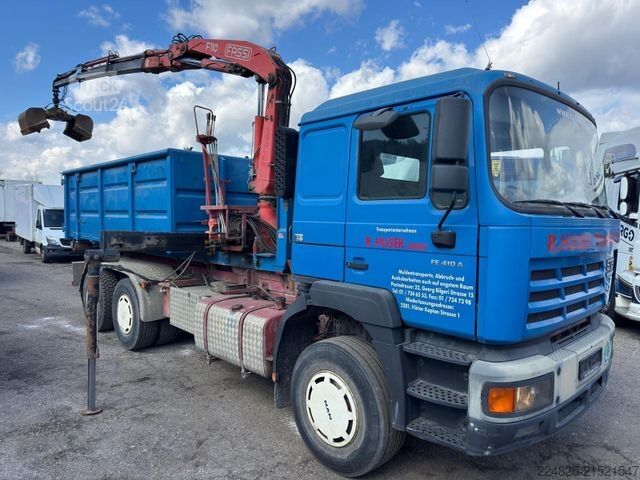 Tovornjak s kavljem za kontejnerje MAN STEYR 33S41 ABROLLCONTAINER+KRAN FASSI+CONTAINER
