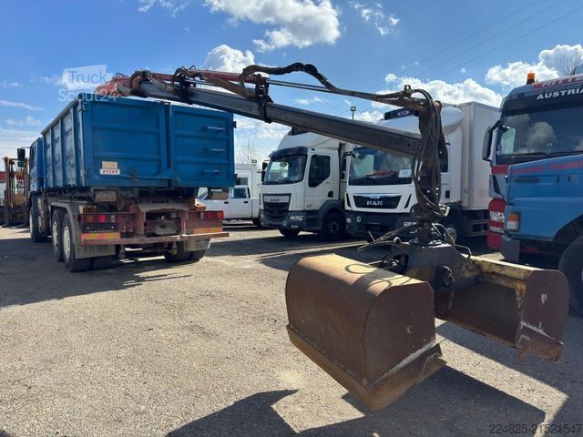 Tovornjak s kavljem za kontejnerje MAN STEYR 33S41 ABROLLCONTAINER+KRAN FASSI+CONTAINER