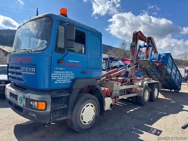 Tovornjak s kavljem za kontejnerje MAN STEYR 33S41 ABROLLCONTAINER+KRAN FASSI+CONTAINER