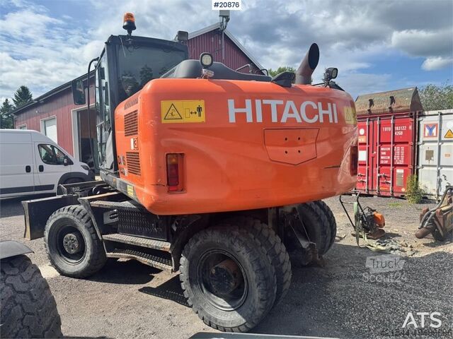 Radbagger Hitachi ZX140W-5B Wheeled excavator w/ Rototilt and 2 buck